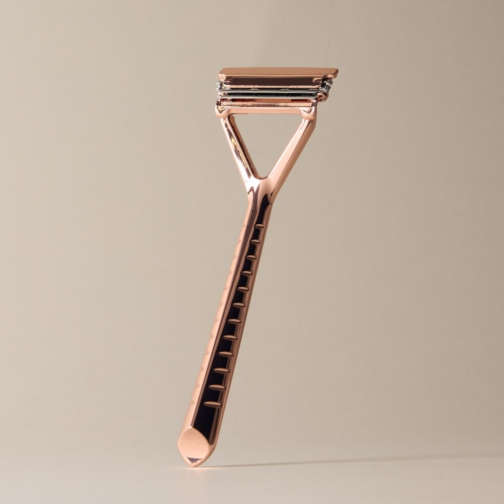 Leaf razor displayed upright in rose gold