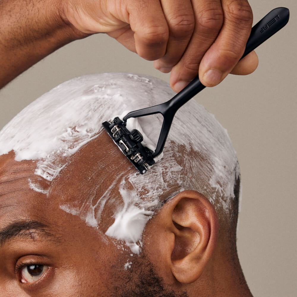 Man uses Leaf razor on his prepped head