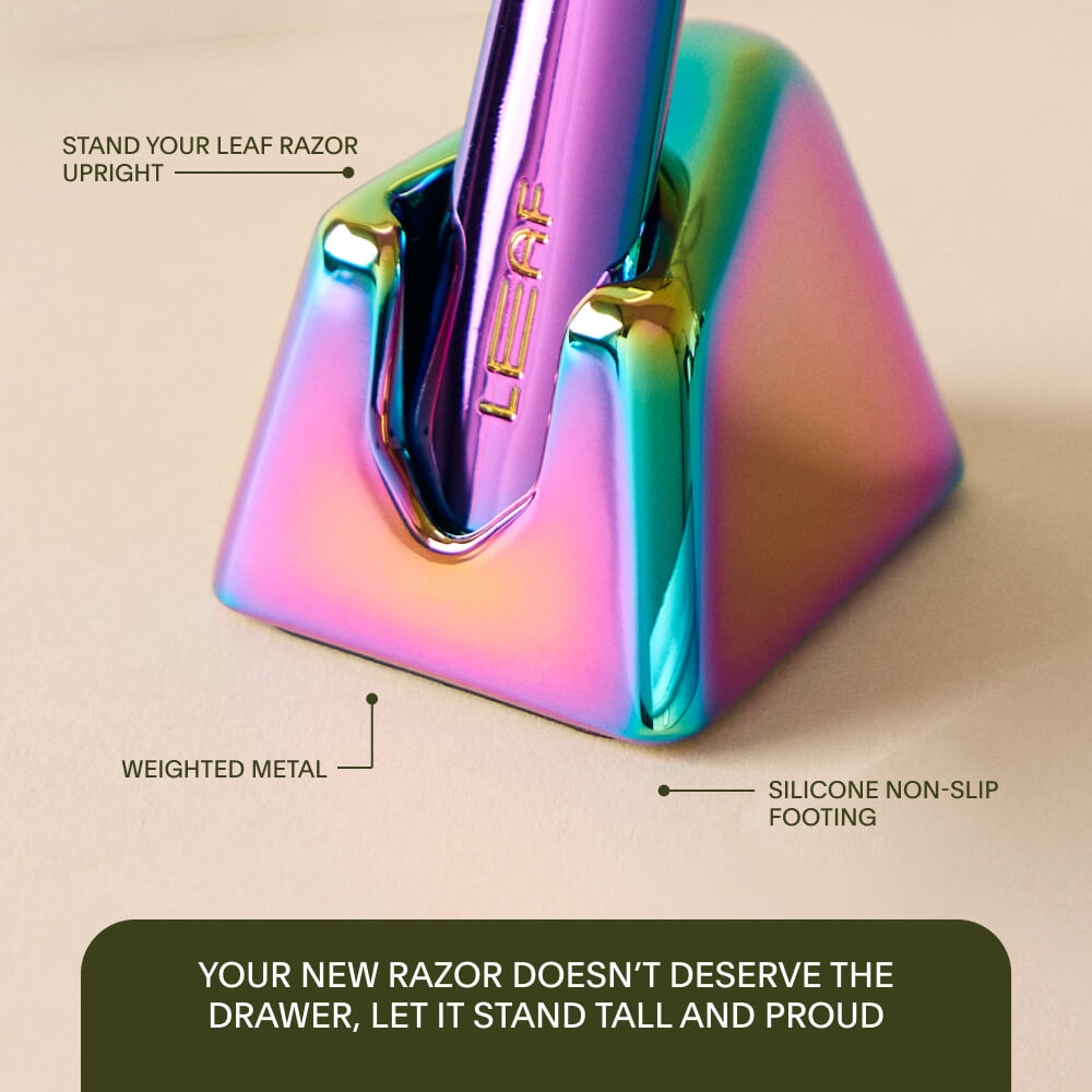 A prism leaf razor stand with the razor inside and feature callouts of the stand