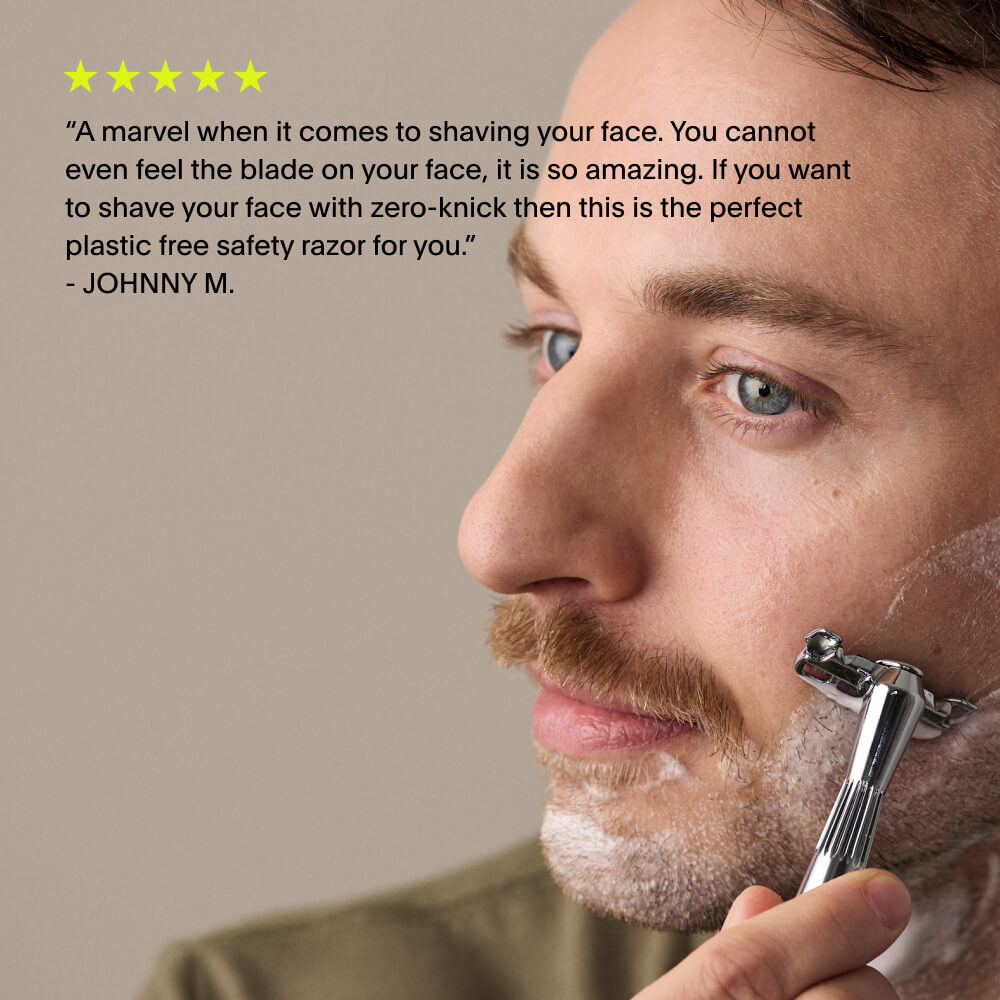 A 5 star review of a single edge razor over a man shaving his beard