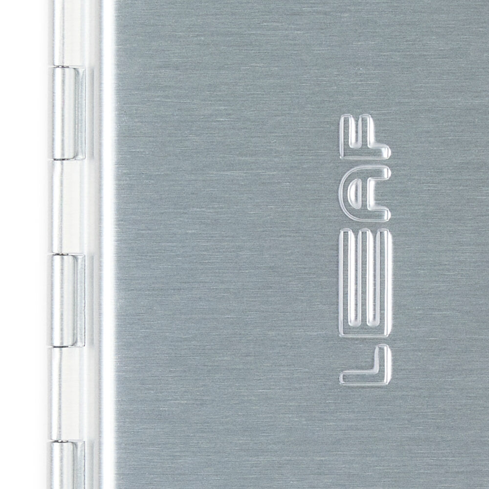 A closed silver single edge razor case closeup