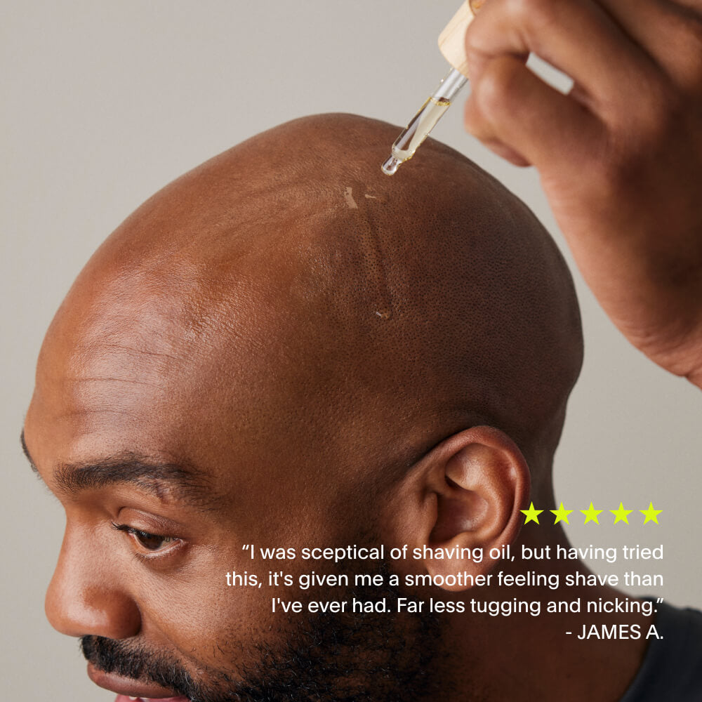 A 5 star review about the shave oil on top of a man dropping the shave oil on his head