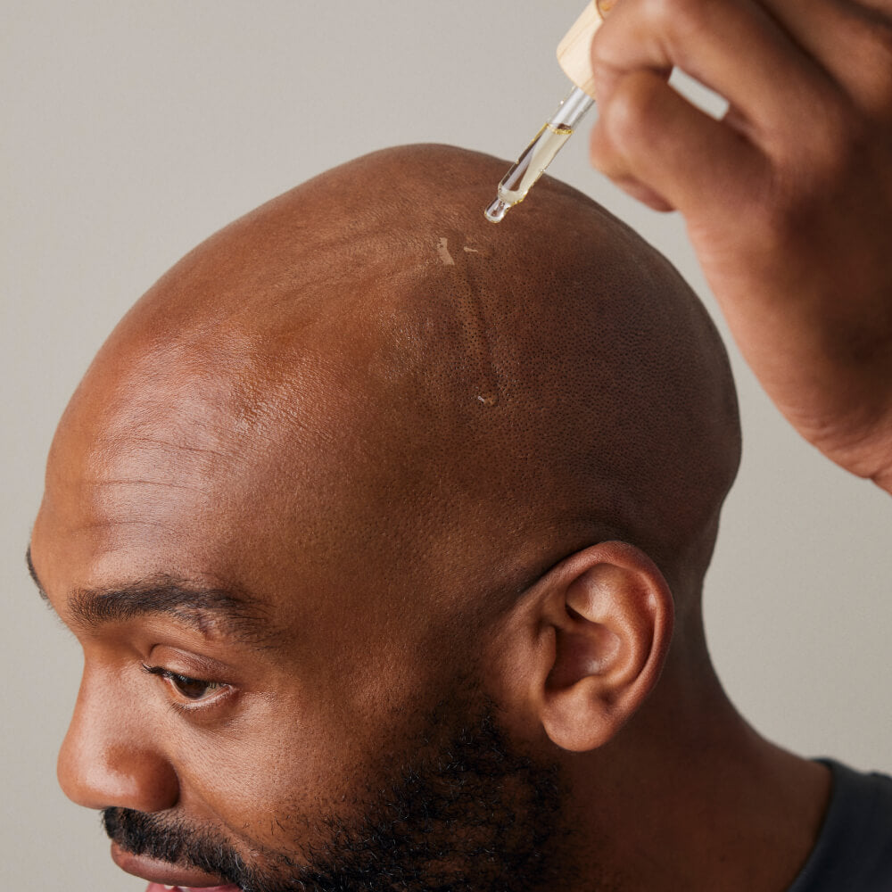 Man drops shave oil on his hed